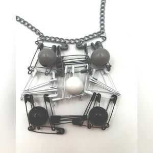 Safety pin necklace.